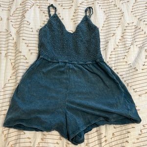 super cute romper in a blue color in a size XS/S
